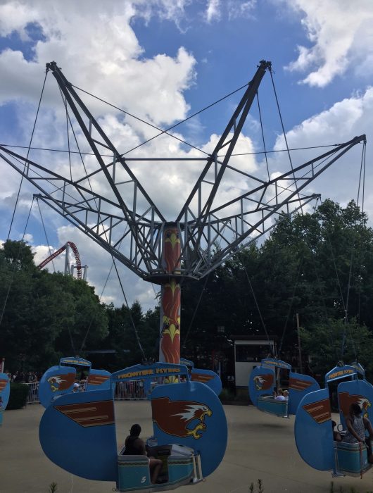 As it turns out, Liberty Flyers (at the time of this photo it was called Frontier Flyers) is a distant step-cousin of the park's Aerial Joy Ride.